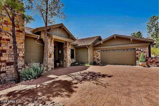 view of front of property with a garage