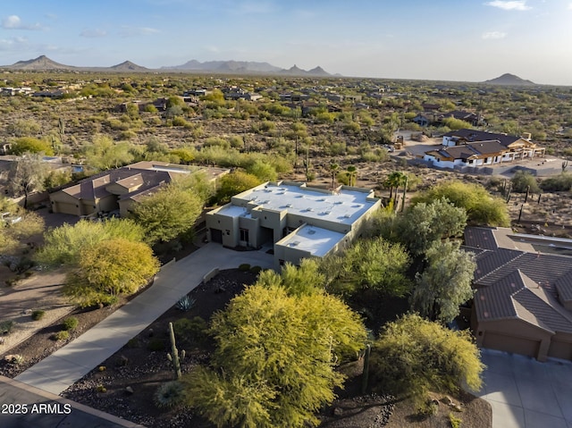 birds eye view of property featuring a mountain view