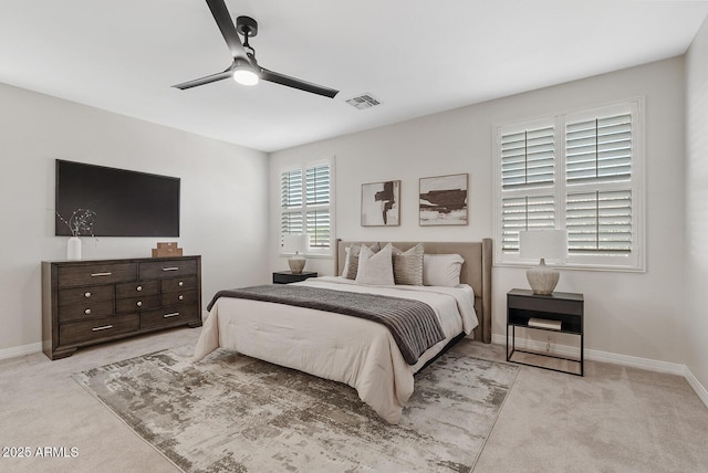 bedroom featuring baseboards, visible vents, ceiling fan, and carpet flooring