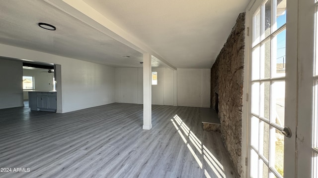 121 E Monte Way, Phoenix, AZ 85042 - below grade area with wood finished floors and ceiling fan