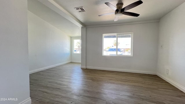 121 E Monte Way, Phoenix, AZ 85042 - spare room featuring ceiling fan, wood finished floors, and baseboards