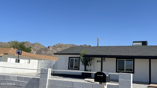 121 E Monte Way, Phoenix, AZ 85042 - view of front of house featuring roof with shingles and stucco siding