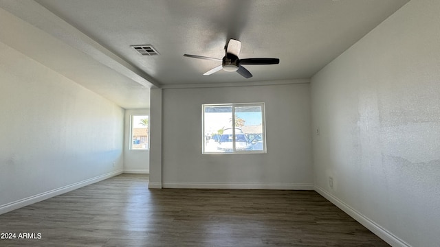 121 E Monte Way, Phoenix, AZ 85042 - spare room featuring wood finished floors, a ceiling fan, and baseboards