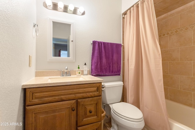 full bath with shower / bath combination with curtain, a textured wall, vanity, and toilet