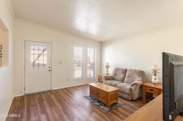 living room featuring dark wood-style floors, a wealth of natural light, crown molding, and baseboards