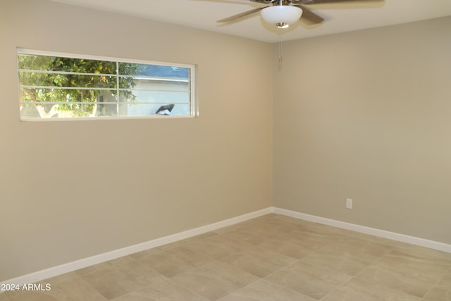 spare room featuring ceiling fan