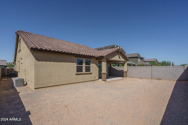 back of property with a patio area