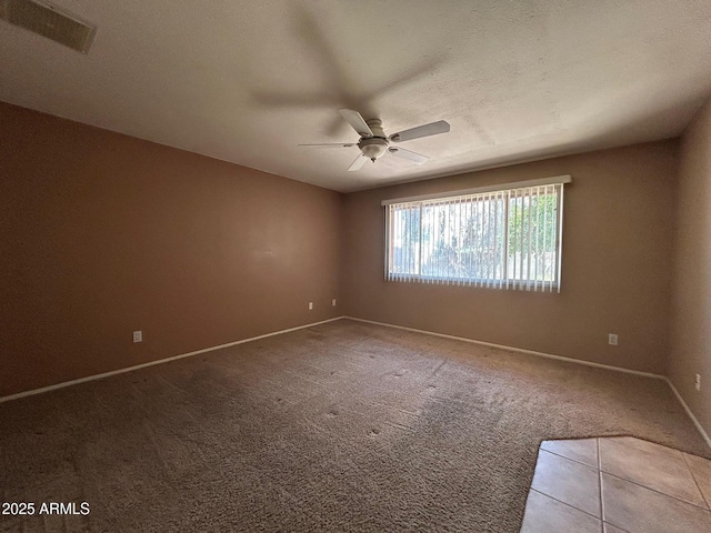 3740 E Mercer Ln, Phoenix, AZ 85028 - carpeted spare room featuring ceiling fan and baseboards