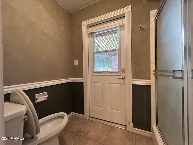 3740 E Mercer Ln, Phoenix, AZ 85028 - full bath featuring tile patterned flooring and a stall shower