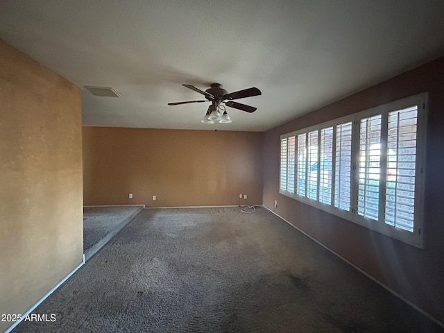 3740 E Mercer Ln, Phoenix, AZ 85028 - unfurnished room featuring carpet flooring and a ceiling fan