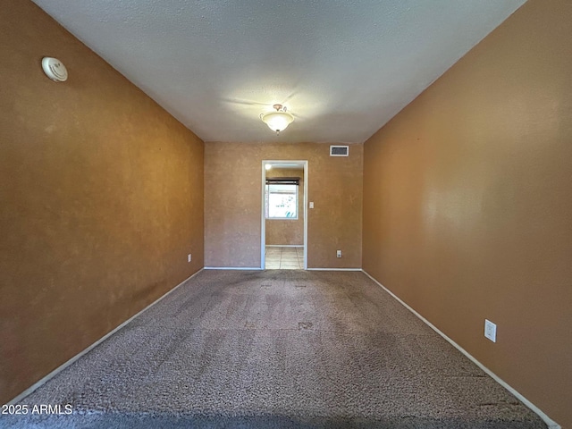 3740 E Mercer Ln, Phoenix, AZ 85028 - carpeted spare room featuring a smoke detector and baseboards