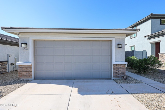 17469 W Daley Ln, Surprise, AZ 85387 - garage with concrete driveway