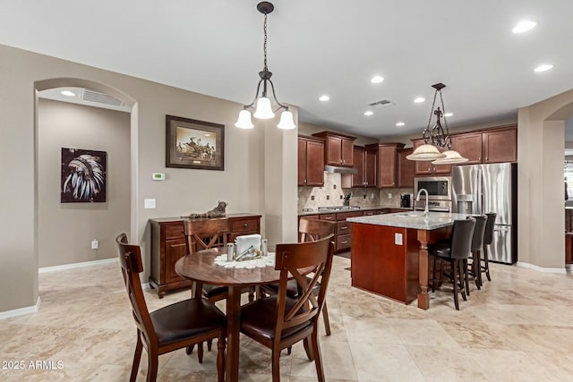 dining area with sink