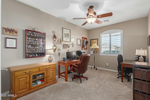 office with ceiling fan and light colored carpet