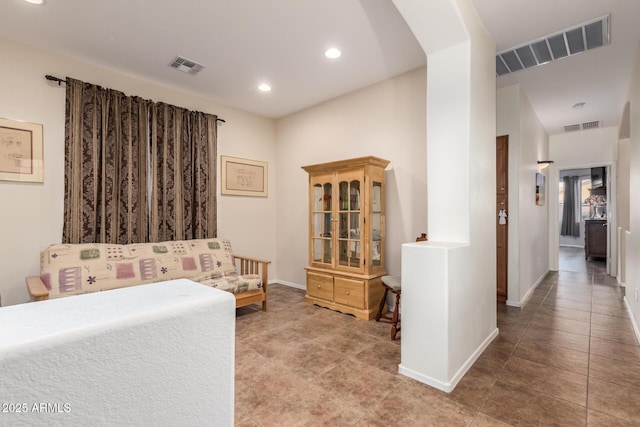 corridor with tile patterned flooring