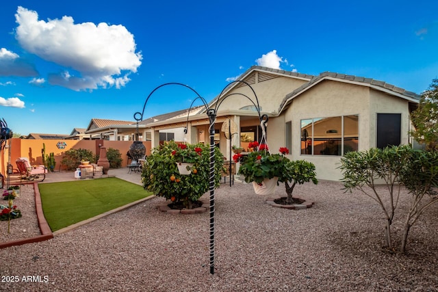 rear view of house featuring a patio area