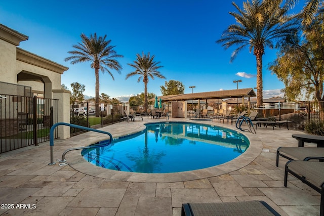 view of swimming pool featuring a patio area