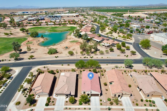 bird's eye view featuring a residential view and a water view