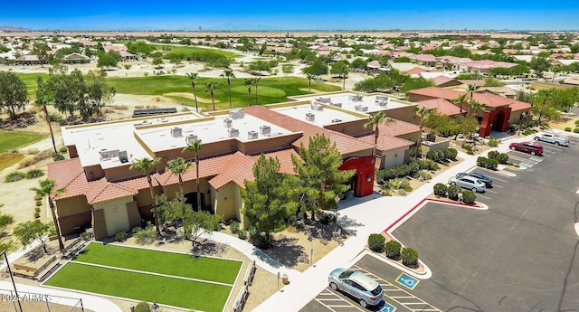 birds eye view of property with a residential view and view of golf course