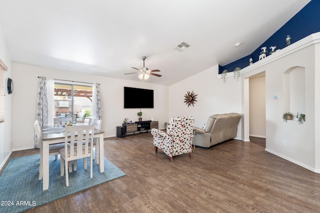 living room featuring hardwood / wood-style flooring and ceiling fan