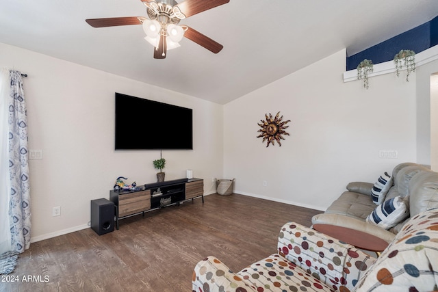 living room with vaulted ceiling, dark hardwood / wood-style floors, and ceiling fan