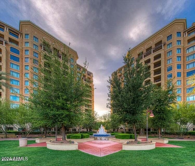 view of community featuring a yard