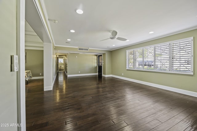 unfurnished living room with visible vents, baseboards, a ceiling fan, ornamental molding, and wood finished floors