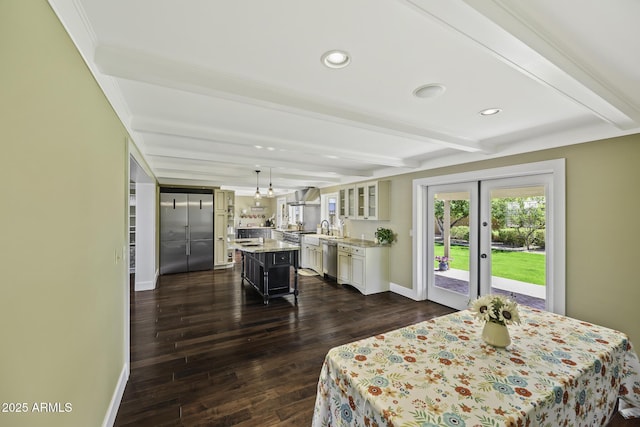 dining area featuring baseboards, dark wood-style flooring, beam ceiling, and recessed lighting