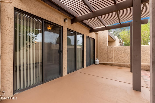 view of patio featuring a pergola