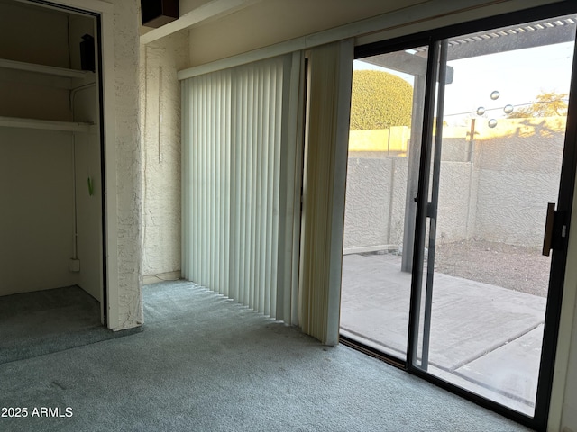 entryway with carpet