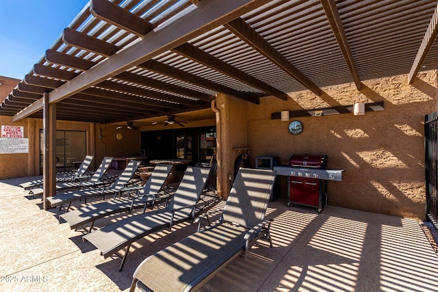 view of patio / terrace with a grill and a pergola