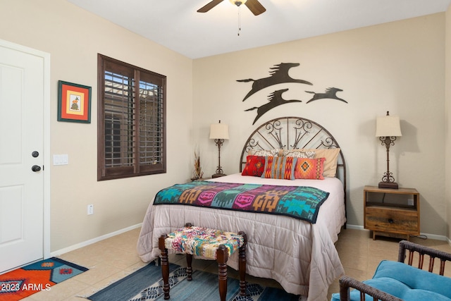 tiled bedroom with ceiling fan