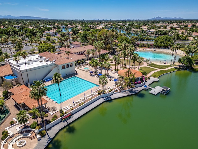 drone / aerial view with a water and mountain view