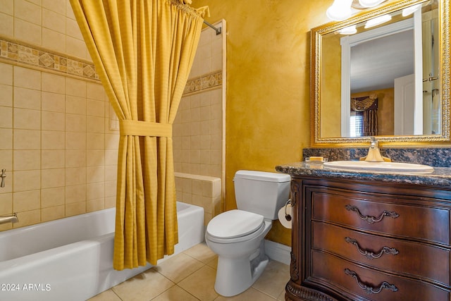 full bathroom with toilet, tile patterned floors, vanity, and shower / tub combo with curtain