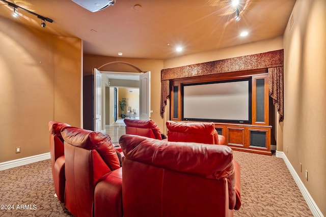 carpeted cinema with track lighting