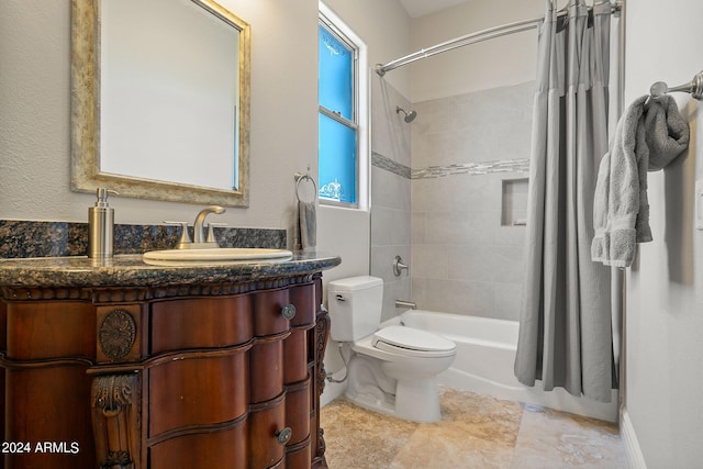 full bathroom with vanity, shower / bath combination with curtain, and toilet