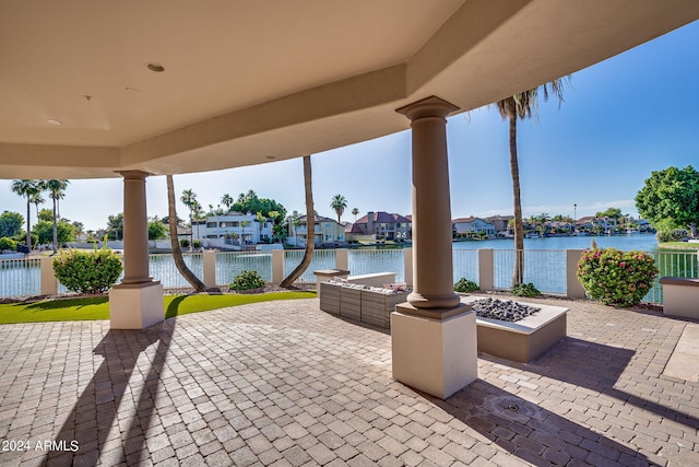 view of patio / terrace featuring an outdoor living space and a water view