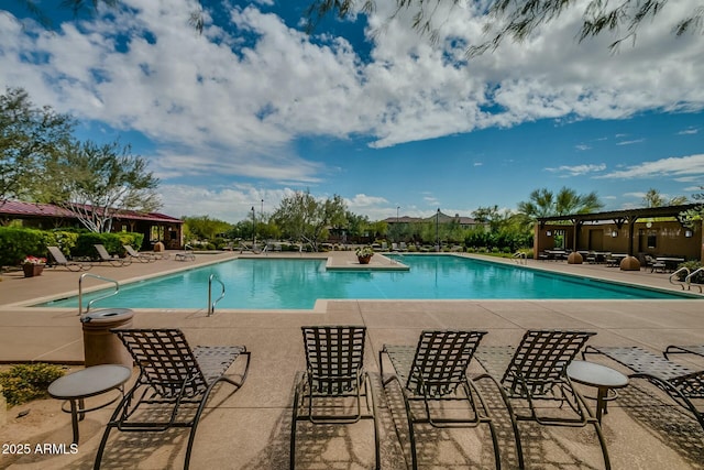 pool featuring a patio area