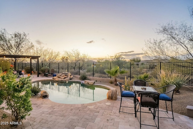 view of pool featuring a fenced in pool, a fenced backyard, and a patio