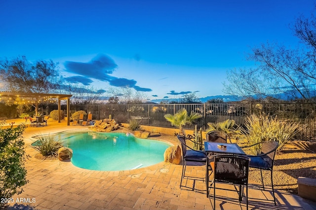 view of pool featuring a fenced in pool, outdoor dining space, a fenced backyard, and a patio