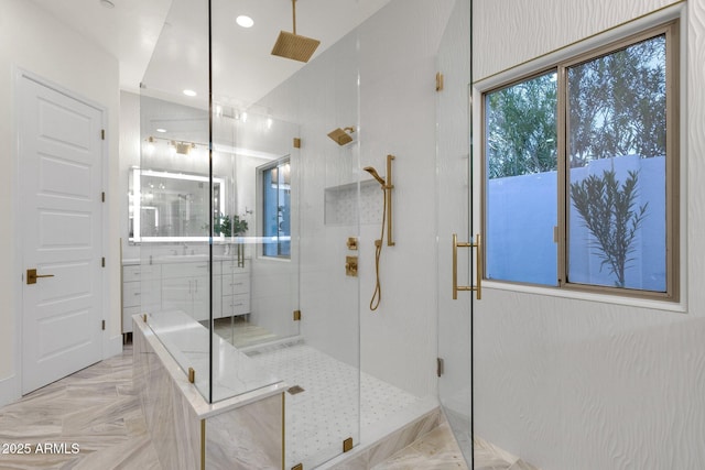 bathroom with a shower with shower door