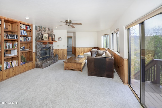 125 Partridge Ln, Prescott, AZ 86303 - living area featuring wood walls, wainscoting, a ceiling fan, and carpet floors