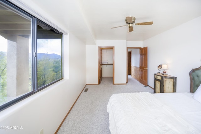 125 Partridge Ln, Prescott, AZ 86303 - carpeted bedroom with visible vents, baseboards, a closet, ceiling fan, and a walk in closet