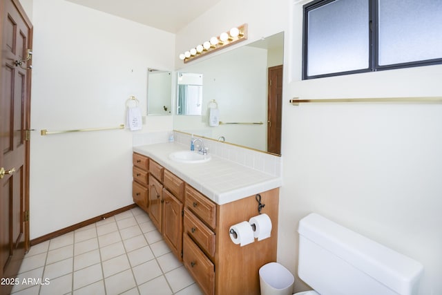 125 Partridge Ln, Prescott, AZ 86303 - bathroom featuring tile patterned floors, toilet, vanity, and baseboards