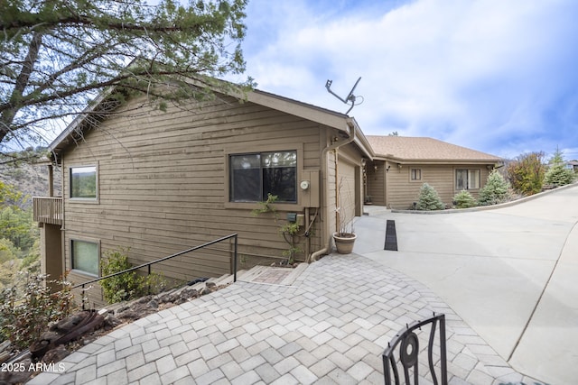 125 Partridge Ln, Prescott, AZ 86303 - view of front facade with a garage and driveway