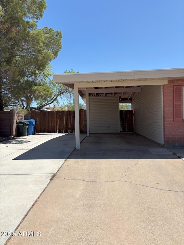 4910 E Foothills Dr, Sierra Vista, AZ 85635 - view of car parking with driveway and an attached carport