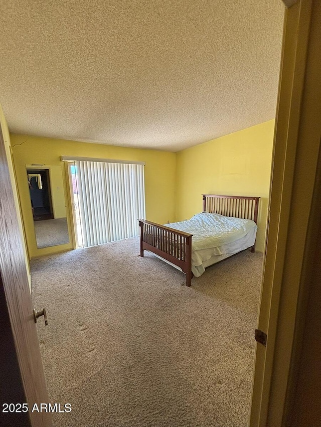 4910 E Foothills Dr, Sierra Vista, AZ 85635 - carpeted bedroom featuring a textured ceiling