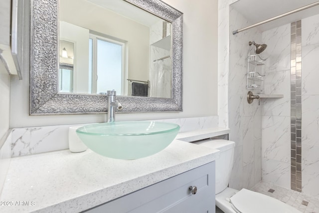 bathroom featuring vanity, a shower with curtain, and toilet