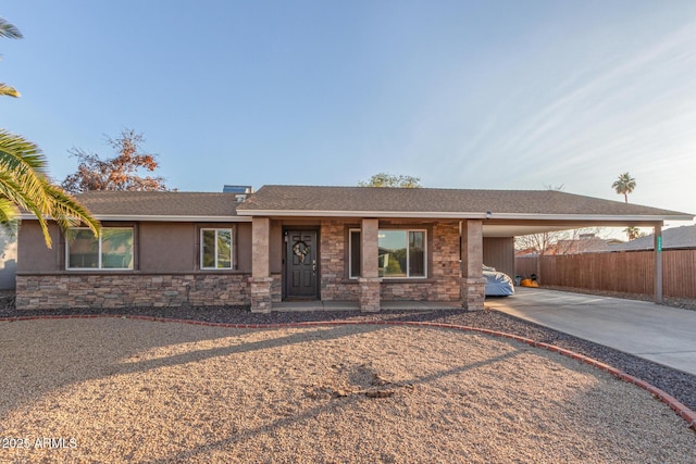 single story home with a carport