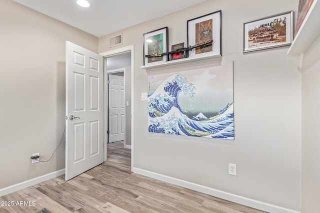 interior space with hardwood / wood-style flooring